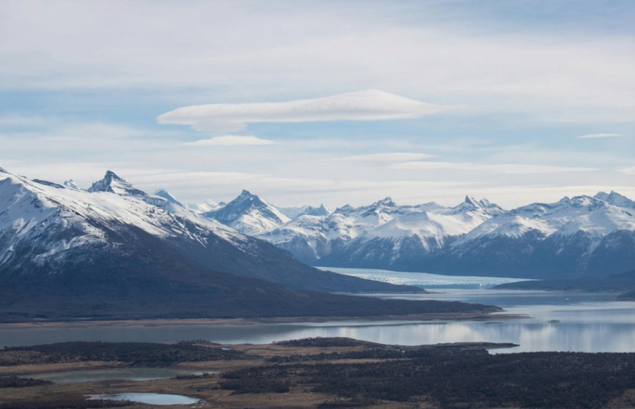 Luxury travel hero — dramatic landscape at dusk